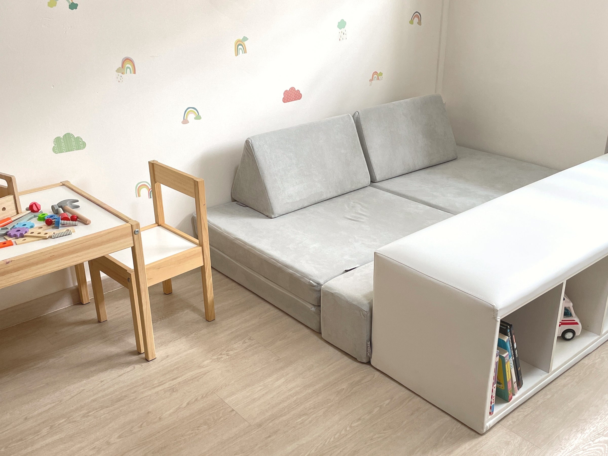 a modular play sofa in a children's play room