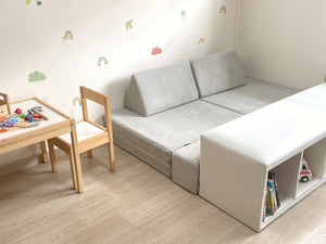 a modular play sofa in a children's play room